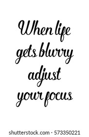 Isolated calligraphy on white background. Quote about photo and photography. When life gets blurry adjust your focus.