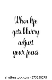 Isolated calligraphy on white background. Quote about photo and photography. When life gets blurry adjust your focus.