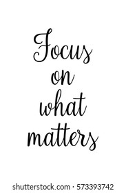 Isolated calligraphy on white background. Quote about photo and photography. Focus on what matters.
