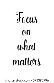 Isolated calligraphy on white background. Quote about photo and photography. Focus on what matters.