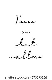 Isolated calligraphy on white background. Quote about photo and photography. Focus on what matters.