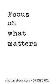 Isolated calligraphy on white background. Quote about photo and photography. Focus on what matters.