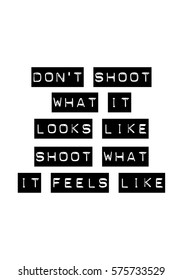 Isolated calligraphy on white background. Quote about photo and photography. Don't shoot what it looks like. Shoot what it feels like.