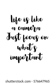 Isolated calligraphy on white background. Quote about photo and photography. Life is like a camera. Just focus on what's important.