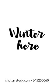 Isolated calligraphy on white background. Quote about winter and Christmas. Winter here.
