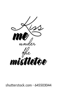 Isolated calligraphy on white background. Quote about winter and Christmas. Kiss me under the mistletoe.