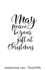Isolated calligraphy on white background. Quote about winter and Christmas. May peace be your gift at Christmas.