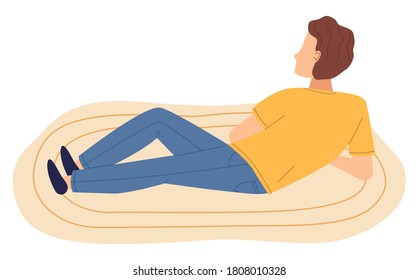 Isolated cartoon character man lying at floor on carpet, back view of guy, man relaxing resting on floor. Brown-haired guy wearing yellow t-shirt and jeans looking forward. Vector illustration