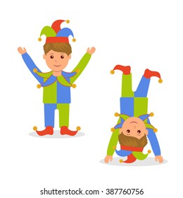Isolated character in jester costume. April Fools Day. Joker standing with arms raised and standing on his head