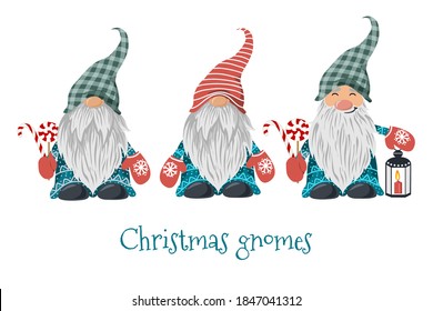 Isolated Christmas gnomes with lollipop and lantern with candle. Vector