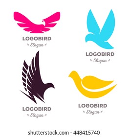 Isolated colorful flying birds vector logo set. Animal logotypes collection. Wings contour illustration. Pigeon silhouette. Eagle icon.