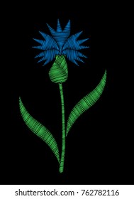 Isolated corn flower embroidery stitches imitation on the black background. Embroidery corn flower.