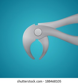 Isolated  Dental forceps on blue background