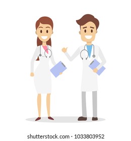 Isolated doctors couple in uniform on white.