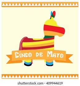 Isolated donkey toy and a ribbon with text on a white background