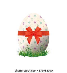 Isolated easter egg with a texture and a ribbon on a white background