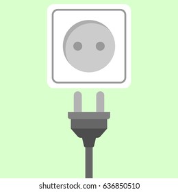 Isolated electrical socket on green background