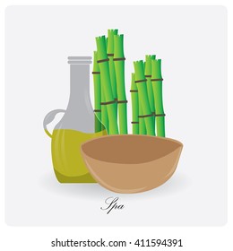 Isolated flask of lotion and bamboo on a white background