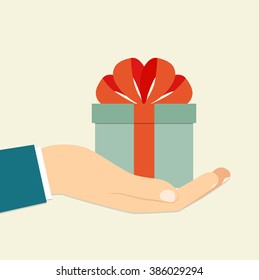 Isolated flat retro icon of a hand holding a blue gift box decorated with a red bow on white background. Vector illustration