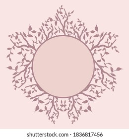 Isolated frame with soft lilac branches with leaves on a soft pinck background stylized with a circle for text