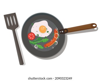 Isolated frying pan with egg and vegetables