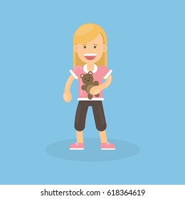 Isolated girl with toy on blue background.