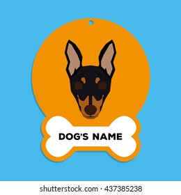 Isolated golden dog tag with text and an illustration of a dog breed