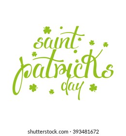 Isolated green text with some clovers on a white background