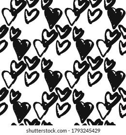 Isolated grunge seamless pattern with heart silhouettes. Hand drawn black love shapes on white background. Monochrome design. For wallpaper, textile, wrapping, fabric print. Vector illustration.