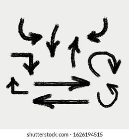 Isolated hand drawn arrows set on a grey background. Vector arrow icon set