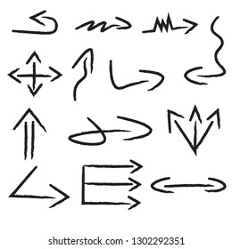 Isolated hand painted arrows with brush stroke of black color - set on a white background.