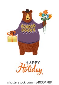 Isolated Hand-drawn cartoon bear wearing a sweater and a hat with a gift and a flowers in his paws. Happy Holiday greeting card design. Vector illustration.