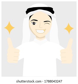 isolated happy young Arab man showing thumbs up on gray background