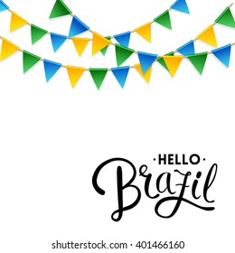 Isolated Hello Brazil text underneath three strings of blue, green and yellow triangular flag decorations