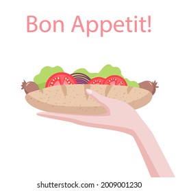 Isolated Hotdog with vegetables in hand on a white background. 