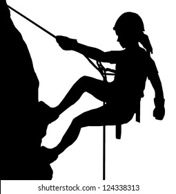 Isolated Image of a Female Abseiler Climbing a Rock Face