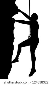 Isolated Image of a Male Abseiler Climbing a Rock Face