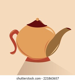 an isolated kettle on a light brown background
