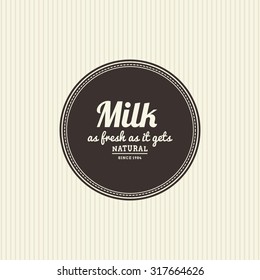 Isolated label with text and an icon for milk products