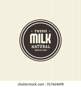 Isolated label with text and an icon for milk products