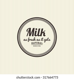 Isolated label with text and an icon for milk products