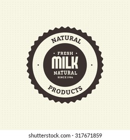 Isolated label with text and an icon for milk products