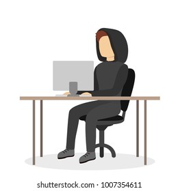 Isolated man hacker sitting at table with computer on white.