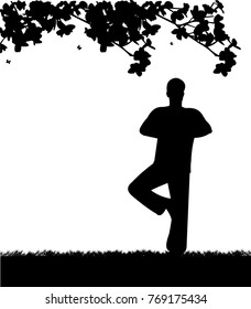 An isolated man meditating and doing yoga exercise under the tree in park silhouette, one in the series of similar images