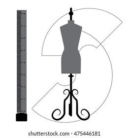 Isolated mannequin with ruler and some prints