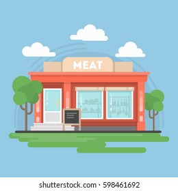 Isolated meat shop. Isolated urban building with sign and storefront. City landscape with clouds and trees.