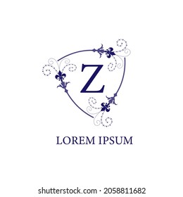 An Isolated on white background decorative floral shield with Lily Flower ornament. Letter Z alphabet initial logo design template. Purple Violet Color Theme.