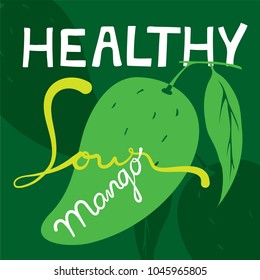 Isolated organic green mango fruit on the dark green background. There are 3 hand written words "healthy","sour" and mango