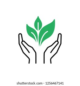 Isolated outline icon of green plant in black hands on white background. Line icon of leaf and hands. Symbol of care, protection, charity.