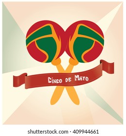 Isolated pair of maracas and a ribbon with text on a textured background